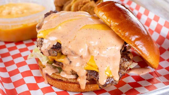 Burger covered in Thousand Island dressing sauce