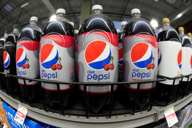 FILE - Bottles of Diet Pepsi Wild Cherry are displayed at a market in Pittsburgh on Jan. 26, 2023. PepsiCo&#39;s revenue rose 7% in the third quarter despite lower demand as the company continued to hike prices. (AP Photo/Gene J. Puskar, File)