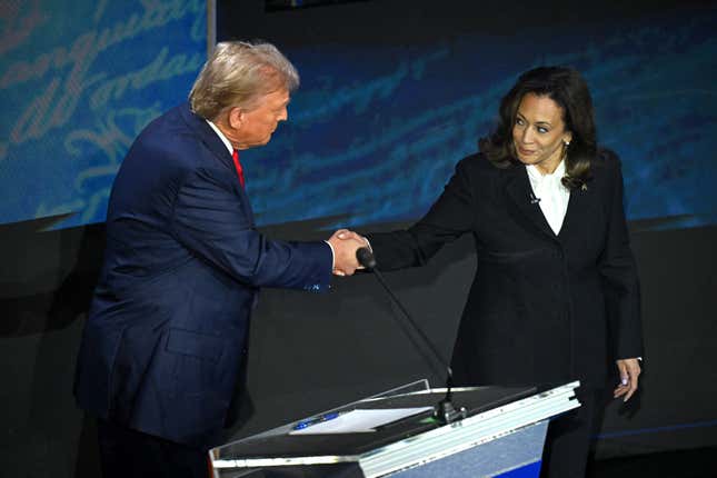 Donald Trump (left) and Kamala Harris (right) shake hands on the debate stage