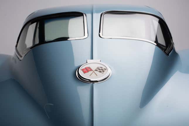 A photo from the bottom of the rear of a '63 Corvette stingray showing its split rear window.