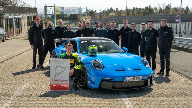 Porsche works driver Kévin Estre poses next to the 911 GT3 with Manthey Performance modifications 