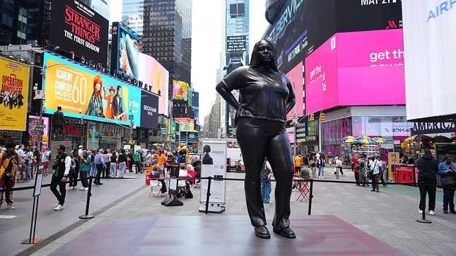 The 12-foot-tall bronze sculpture of a Black woman, titled Grounded in the Stars, stands at the Times Square on May 8, 2025 in New York city