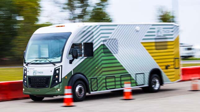 A picture of the test vehicle driving on a road course