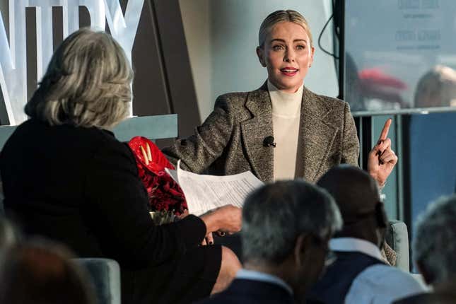 Academy award winning actress Charlize Theron, left, speaks during the Town and Country 10th anniversary philanthropy summit, Thursday, Nov. 2, 2023, in New York. (AP Photo/Bebeto Matthews)