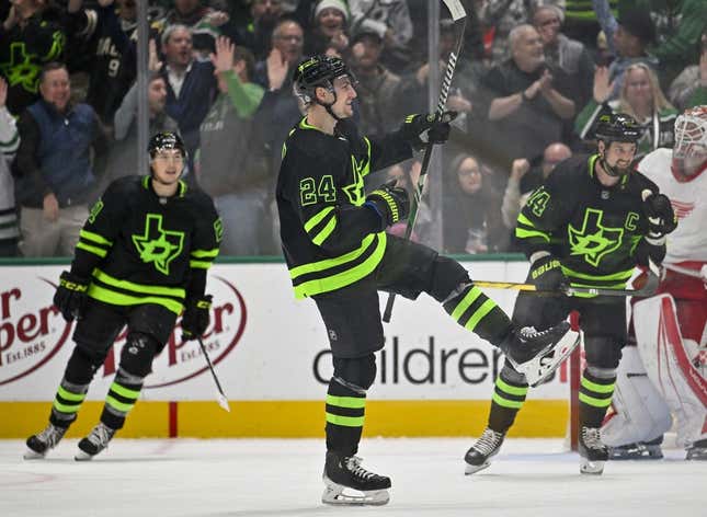 Dec 11, 2023; Dallas, Texas, USA; Dallas Stars center Roope Hintz (24) and left wing Jason Robertson (21) and left wing Jamie Benn (14) celebrates a goal scored by center Joe Pavelski (not pictured) against the Detroit Red Wings during the third period at the American Airlines Center.
