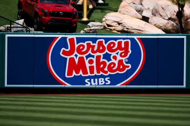 A Jersey Mike’s Subs logo in the outfield during a MLB baseball game April 24, 2024 in Anaheim, California. 