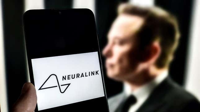 A photo of the Neuralink logo in front of an image of Elon Musk. 