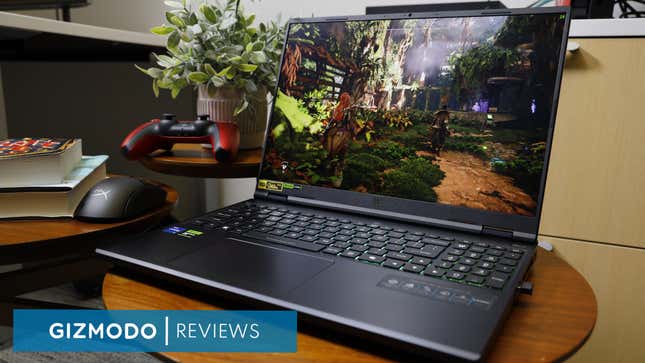 An Acer Predator Helios Neo 2024 showing Horizon Forbidden West on the screen surrounded by books a controller and mouse