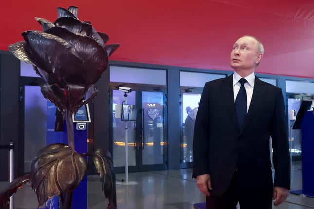 Russian President Vladimir Putin visits the Russia Expo international exhibition and forum at the VDNKh (The Exhibition of Achievements of National Economy) in Moscow, Russia, Sunday, Dec. 17, 2023. (Mikhail Klimentyev, Sputnik, Kremlin Pool Photo via AP)