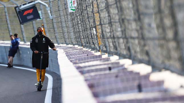 Lewis Hamilton surveys the banking and wall around the outside of the final corner at Zandvoort ahead of this weekend’s Dutch Grand Prix.