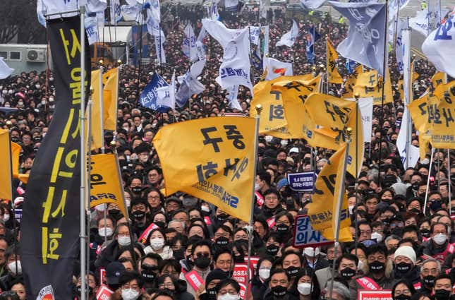 FILE - Doctors stage a rally against the government&#39;s medical policy in Seoul, South Korea, Sunday, March 3, 2024. As South Koreans prepare to vote for a new 300-member parliament next week, many are choosing their livelihoods and other domestic topics as their most important election issues. This represents a stark contrast from past elections, which were overshadowed by security and foreign policy issues like North Korean nuclear threats and the U.S. security commitment. (AP Photo/Ahn Young-joon, File)