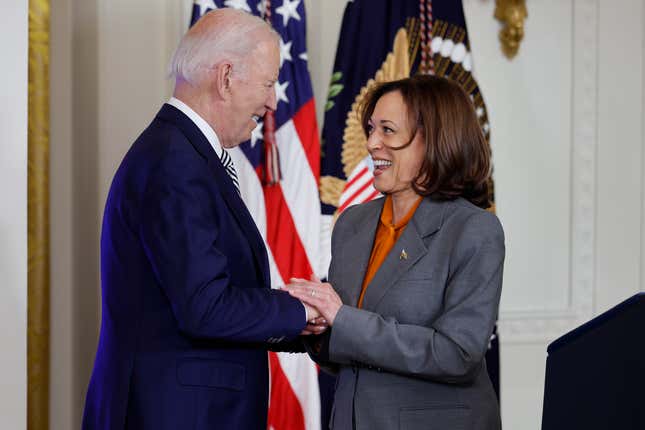 WASHINGTON, DC - OCTOBER 30: U.S. Vice President Kamala Harris introduces President Joe Biden during an event about their administration’s work to regulate artificial intelligence in the East Room of the White House on October 30, 2023 in Washington, DC. President Biden issued a new executive order on Monday, directing his administration to create a new chief AI officer, track companies developing the most powerful AI systems, adopt stronger privacy policies and “both deploy AI and guard against its possible bias,” creating new safety guidelines and industry standards. 