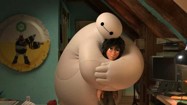 Baymax gives Hiro a hug.