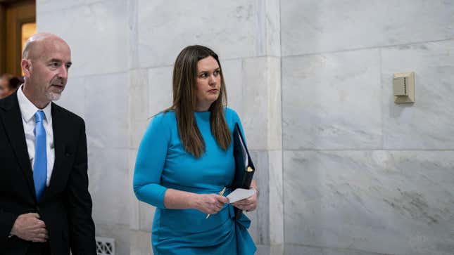 Sarah Huckabee Sanders, governor of Arkansas, right, walks with Jacob Oliva, Arkansas education secretary, prior to unveiling the Arkansas LEARNS education bill at the Arkansas State Capitol in Little Rock, Arkansas, US, on Wednesday, Feb. 8, 2023. 