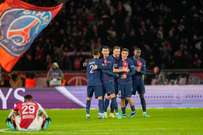 PSG&#39;s players celebrate at the end of the French League One soccer match between Paris Saint-Germain and Monaco, at the Parc des Princes stadium in Paris, France, Friday, Nov. 24, 2023. (AP Photo/Michel Euler)