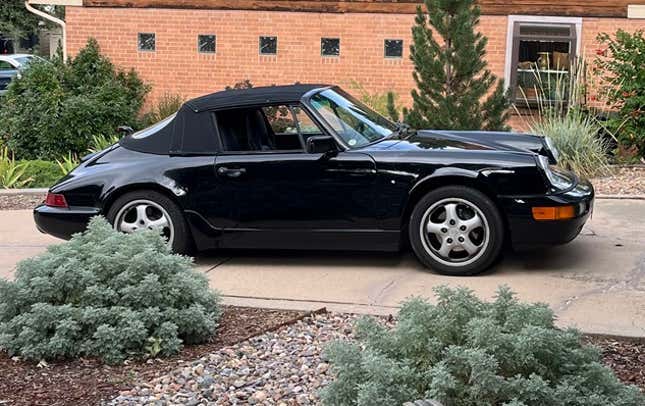 A black 1990 Porsche 964