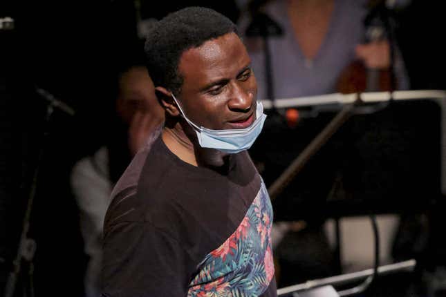 Canadian conductor Kwame Ryan leads a rehearsal of “The Time of Our Singing” opera, created by Belgian musician Kris Defoort and inspired by a novel of US author Richard Powers at the Theatre Royal de la Monnaie theatre in Brussels, on September 3, 2021. 