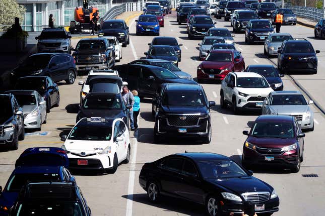 FILE - Heavy traffic is seen at O&#39;Hare International Airport in Chicago, Monday, April 15, 2024. Relentlessly rising auto insurance rates are squeezing car owners and stoking inflation. Auto insurance rates rose 2.6% in March and are up 22% from a year ago. (AP Photo/Nam Y. Huh, File)