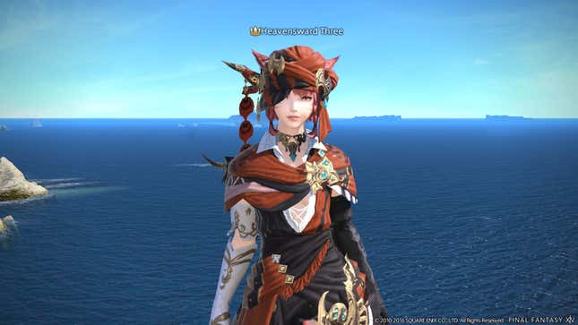A mentor Miqo'te stands in front of the ocean