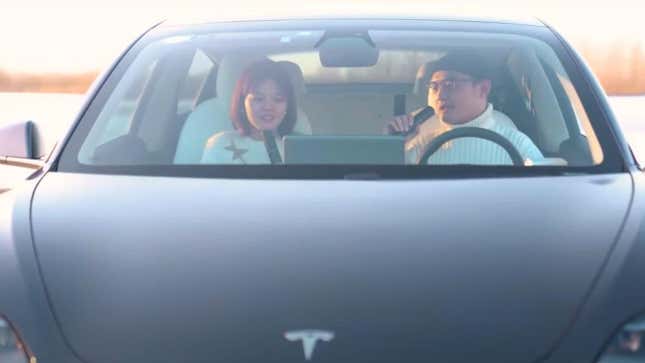 Image for article titled Tesla’s Karaoke Mic Gives Drivers A New Thing To Hold Instead Of The Steering Wheel