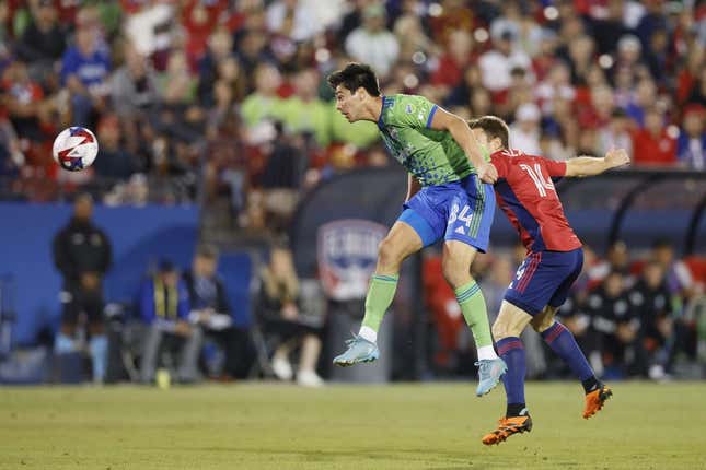 Nov 4, 2023; Frisco, Texas, USA; Seattle Sounders midfielder Josh Atencio (84) heads the ball against FC Dallas midfielder Asier Illarramendi (14) during the first half of game two in a round one match of the 2023 MLS Cup Playoffs at Toyota Stadium.