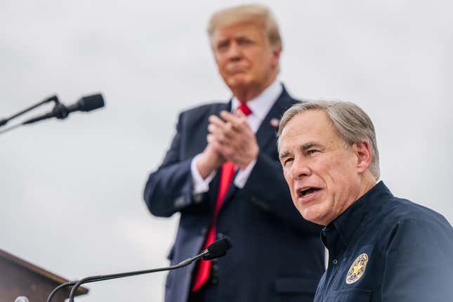 Texas Gov. Greg Abbott speaks alongside former President Donald Trump during a tour to an unfinished section of the border wall on June 30, 2021 in Pharr, Texas. 