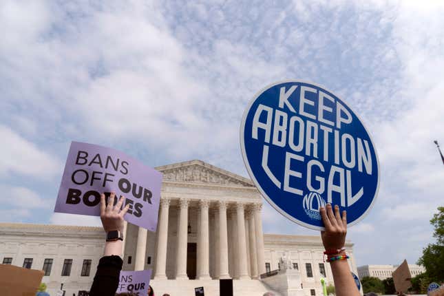 Demonstrators protest outside of the Supreme Court Tuesday, May 3, 2022 in Washington. A draft opinion suggests the U.S. Supreme Court could be poised to overturn the landmark 1973 Roe v. Wade case that legalized abortion nationwide, according to a Politico report released Monday. Whatever the outcome, the Politico report represents an extremely rare breach of the court’s secretive deliberation process, and on a case of surpassing importance.