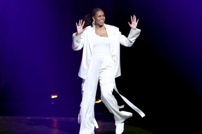 INGLEWOOD, CALIFORNIA - DECEMBER 13: Michelle Obama walks onstage during The Light We Carry: Overcoming in Uncertain Times - in Conversation with Michelle Obama at YouTube Theater on December 13, 2022 in Inglewood, California. 