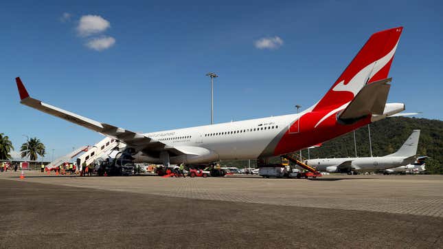 The Qantas plane is seen as Australian athletes gather at Cairns Airport as they head to Tokyo for the 2020 Olympic Games on July 17, 2021 in Cairns, Australia.