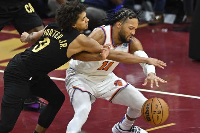 Oct 31, 2023; Cleveland, Ohio, USA; Cleveland Cavaliers guard Craig Porter (9) defends New York Knicks guard Jalen Brunson (11) in the fourth quarter at Rocket Mortgage FieldHouse.