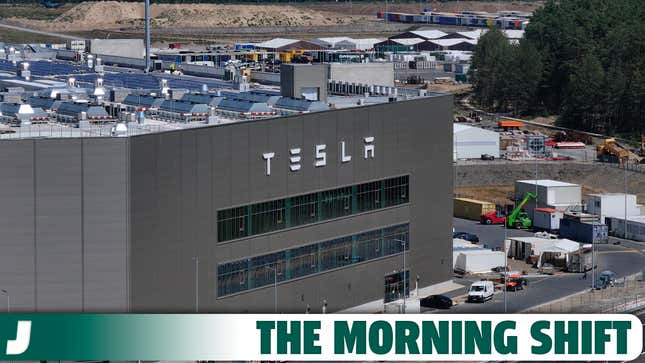 In this aerial view the Tesla logo hangs on the facade of a building at the Tesla factory on July 17, 2023 near Gruenheide, Germany.