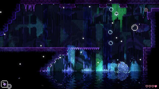 A screenshot of Animal Well shows a fish rising up out of a pool of water and seemingly spouting bubbles.
