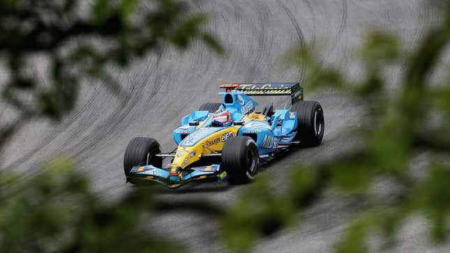 Fernando Alonso drives his 2004 Renault F1 car at the Brazilian Grand Prix. 