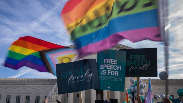 People on both sides of the debate rally outside the Supreme Court in Washington, Monday, Dec. 5, 2022.