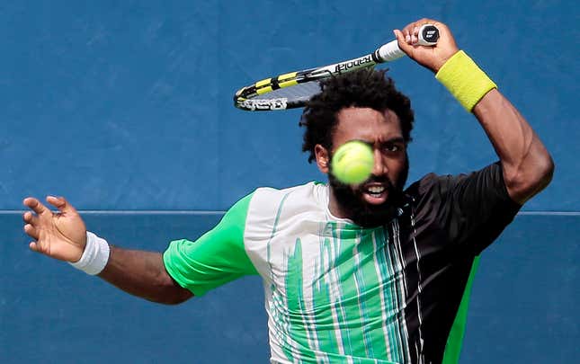 Evan King, of the United States, returns a shot from Pablo Carreno Busta, of Spain, during the first round of the U.S. Open tennis tournament, Monday, Aug. 28, 2017, in New York. (AP Photo/Andres Kudacki)