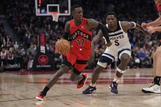 Oct 25, 2023; Toronto, Ontario, CAN; Toronto Raptors guard Dennis Schroder (17) drives to the net past Minnesota Timberwolves guard Anthony Edwards (5) during the second half at Scotiabank Arena.