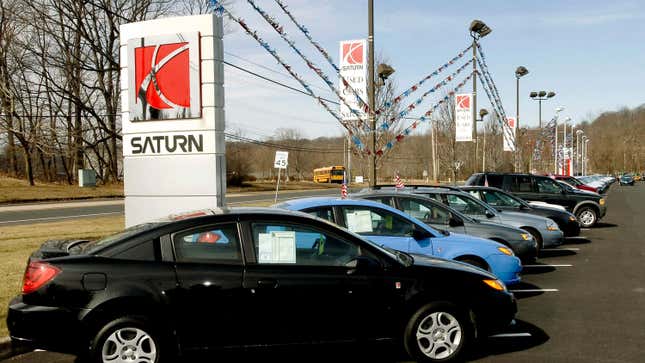New and previously owned General Motors Saturn vehicles sit on the Fred Beans dealership lot in Doylestown, Pennsylvania, U.S., on Saturday, Feb. 28, 2009.