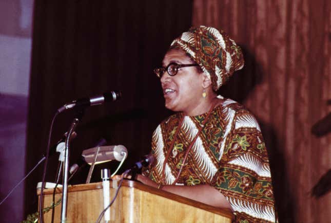 Audre Lorde talking on microphone at The Phillis Wheatley Poetry Festival.