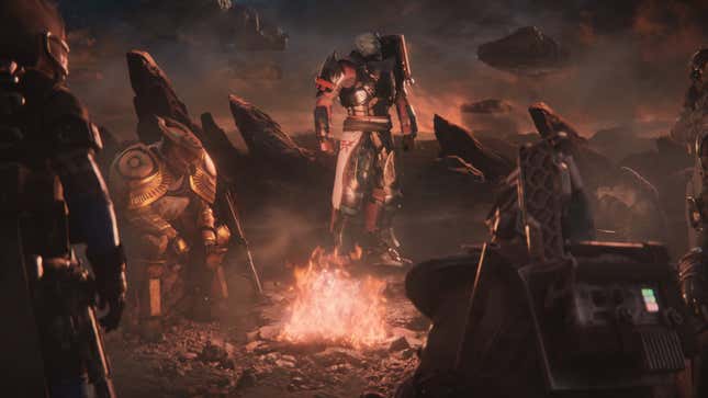 A screenshot of a trailer for The Final Shape. Commander Zavala is surrounded by several Guardians at a campfire.