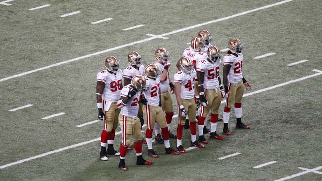 Members of the San Francisco 49ers wait for a kick off during the third quarter of an NFL football game against the St. Louis Rams Sunday, Jan. 1, 2012, in St. Louis.