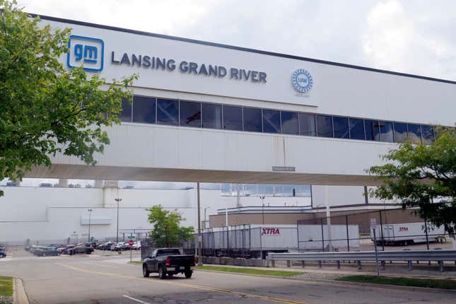 A vehicle enters General Motor’s Lansing Grand River Assembly plant, Tuesday, Sept. 12, 2023, in Lansing, Mich., just days before auto workers could potentially strike due failed contract negotiations. (AP Photo/Joey Cappelletti)