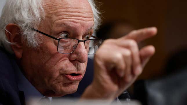 Bernie Sanders points his finger at a Senate hearing. 