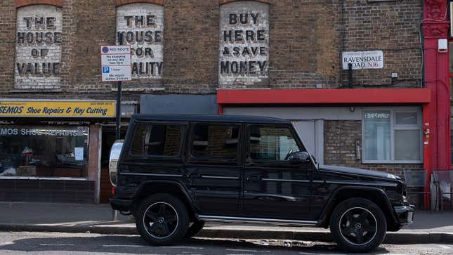 A photo of a Mercedes SUV parked in London. 