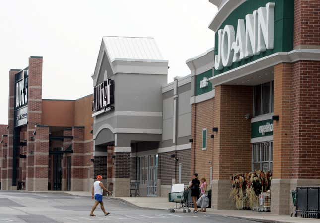 FILE - People walk into and out of a Joann store, Sept. 6, 2007, in Garfield Heights, Ohio. The fabric and crafts retailer has filed for Chapter 11 bankruptcy protection, as consumers continue to cut back on discretionary spending. In a Monday, March 18, 2024 release, the Hudson, Ohio-based company said that it expected to emerge from bankruptcy as early as the end of next month. (AP Photo/Tony Dejak, file)