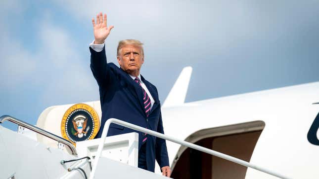 President Donald J. Trump disembarks Marine One at Joint Base Andrews, Md. Friday, Sept. 18, 2020, and is escorted to Air Force One by U.S. Air Force personnel.