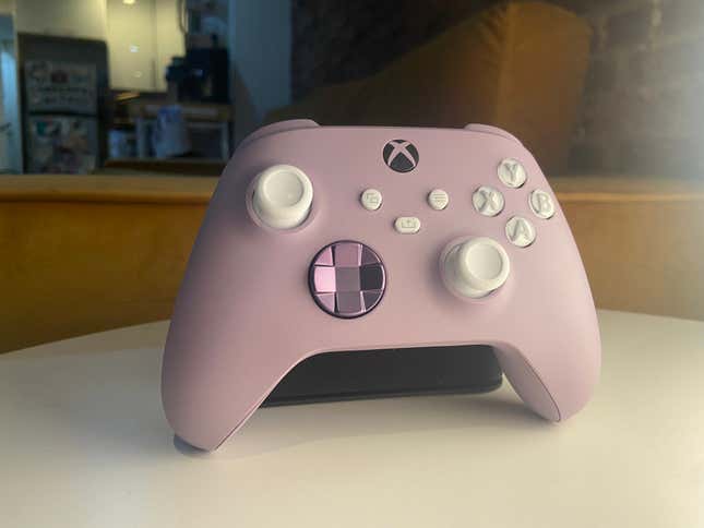 A custom Xbox Series X/S controller featuring lavender base color, white buttons, and metallic purple D-pad