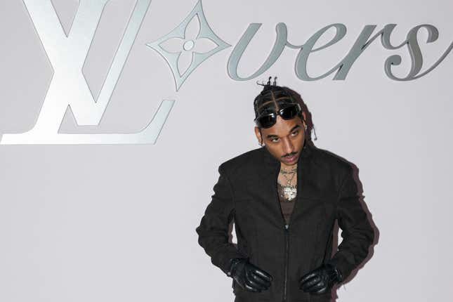 Image for article titled Fly Black Celeb Looks at the Louis Vuitton Show at Paris Fashion Week