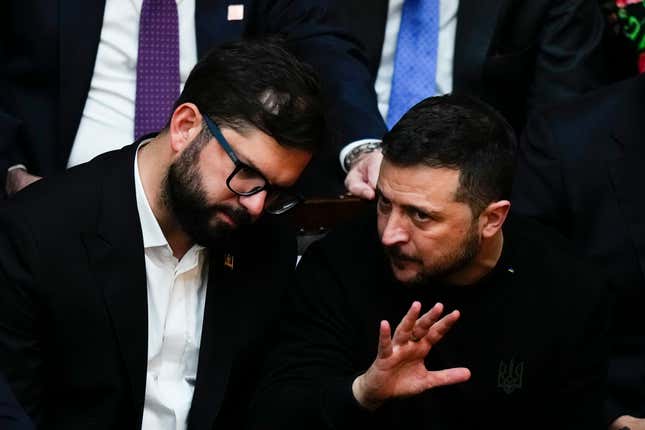 Chile&#39;s President Gabriel Boric, right, talks to Ukrainian President Volodymyr Zelenskyy during the swearing-in ceremony for new Argentina&#39;s President Javier Milei at Congress in Buenos Aires, Argentina, Sunday, Dec. 10, 2023. (AP Photo/Natacha Pisarenko)