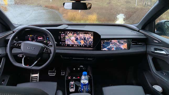 A photo of the dash of the SQ6 showing its three screens 