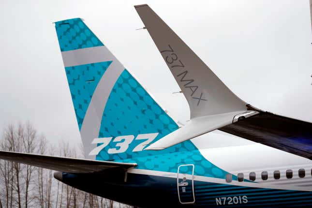 FILE- In this Feb. 5, 2018, file photo, a dual-tipped wing tip, known as a &quot;winglet,&quot; stands in view of the tail of a Boeing 737 MAX 7, the newest version of Boeing&#39;s fastest-selling airplane, while displayed during a debut for employees and media of the new jet in Renton, Wash. Boeing is asking airlines to inspect its 737 Max jets for a potential loose bolt in the rudder control system, the airplane maker and Federal Aviation Administration confirmed this week, Friday, Dec. 29, 2023. (AP Photo/Elaine Thompson, File)